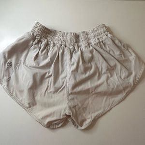 White Lululemon size 0 shorts. 2. 5 inch hottie hots.